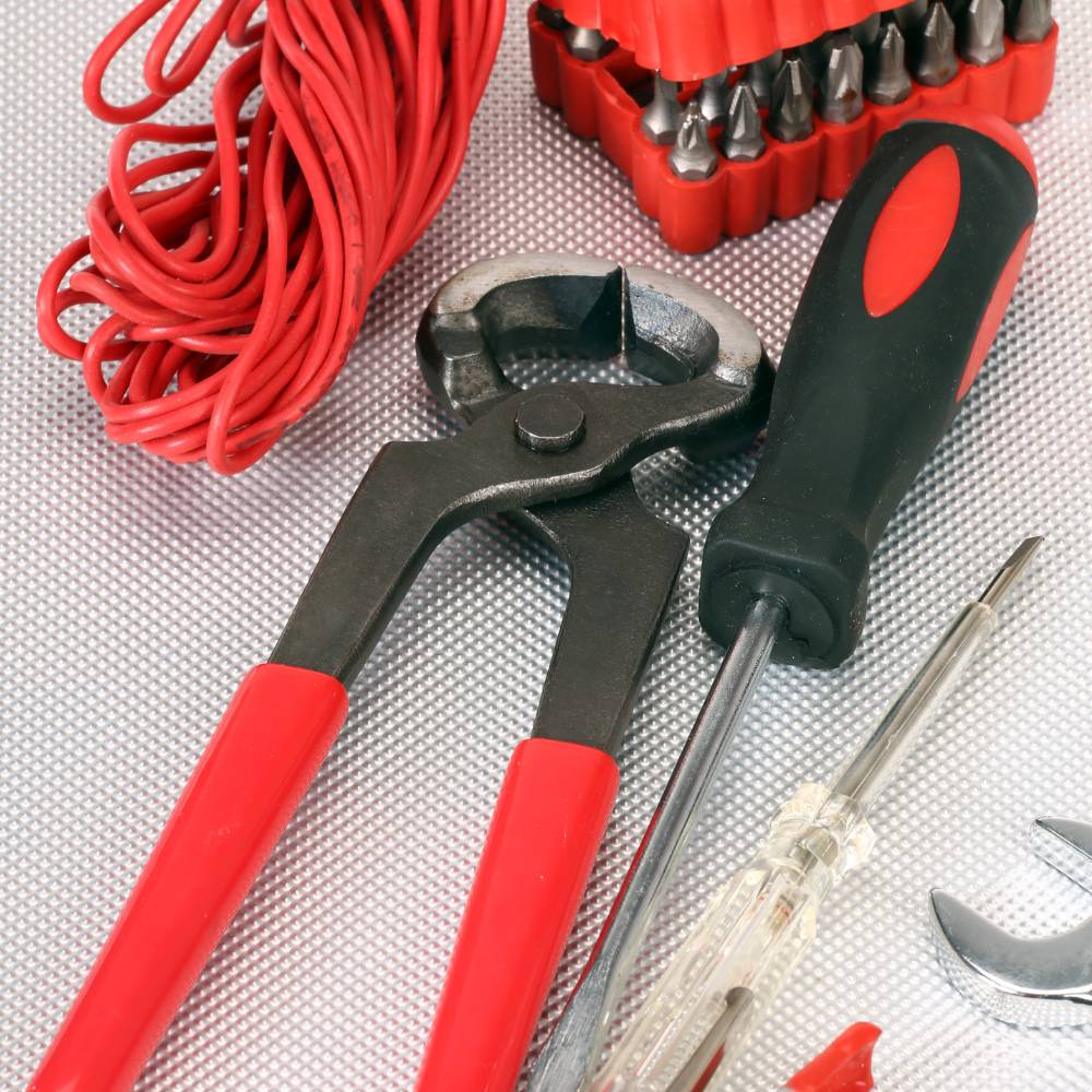 Industrial hand tools including wrenches and drivers